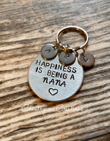 “Happiness is being a” keychain.